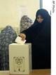 Woman voting in Iran