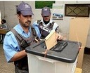 police officer at the polls