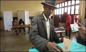 Man casting ballot in Madagascar